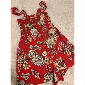 Romper orange with white flowers